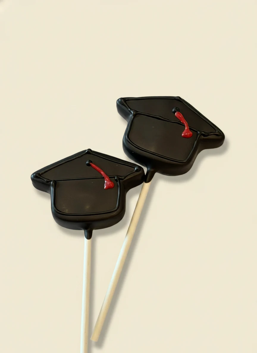 Custom themed cake pops by Lotus Sweet Treats.