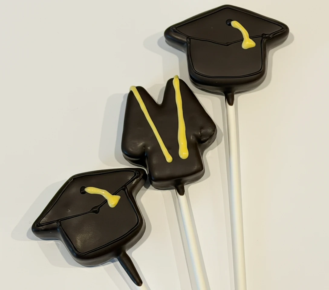 Custom themed cake pops by Lotus Sweet Treats.