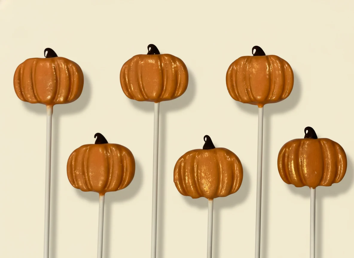 Custom themed cake pops by Lotus Sweet Treats.